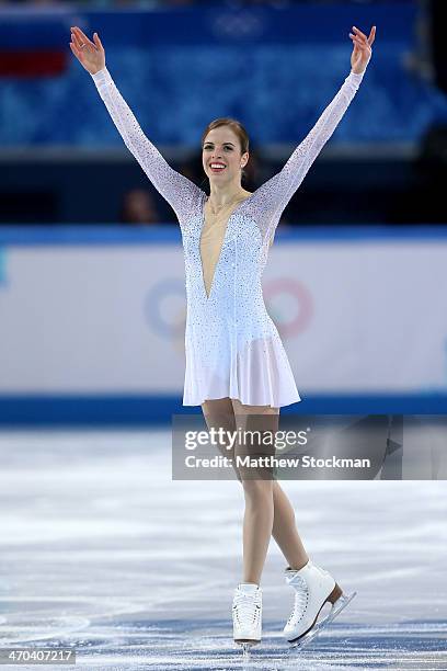 Carolina Kostner of Italy reacts after competing in the Figure Skating Ladies' Short Program on day 12 of the Sochi 2014 Winter Olympics at Iceberg...