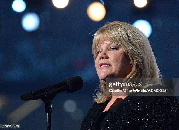 Andrea Swift speaks onstage during the 50th Academy Of Country Music Awards at AT&T Stadium on April 19, 2015 in Arlington, Texas.