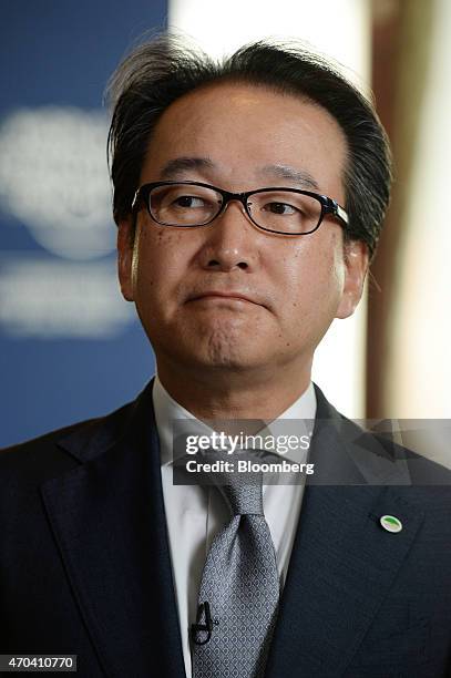 Ichiro Ino, chief executive of Asia Pacific at Hitachi Ltd., listens during a Bloomberg Television interview at the World Economic Forum on East Asia...