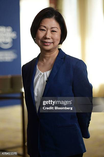 Teresita Sy-Coson, vice chairperson of SM Investments Corp., poses for a photograph prior to a Bloomberg Television interview at the World Economic...