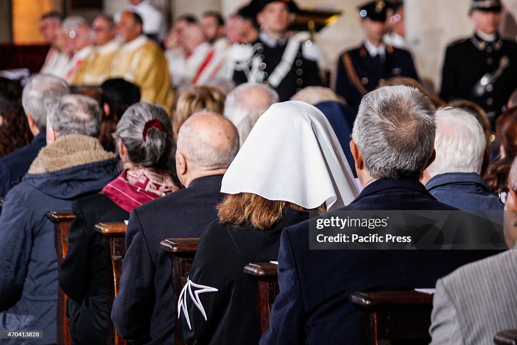 The faithful at the Mass for Holy Shroud...