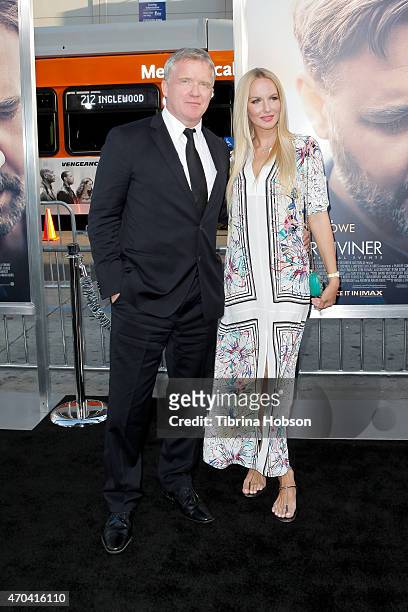 Anthony Michael Hall and Lucia Oskerova attend the premiere of 'The Water Diviner' at TCL Chinese Theatre on April 16, 2015 in Hollywood, California.