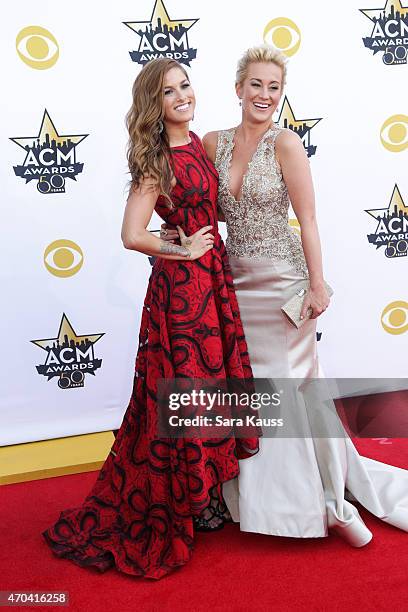 Singers Cassadee Pope and Kellie Pickler attend the 50th Academy Of Country Music Awards at AT&T Stadium on April 19, 2015 in Arlington, Texas.