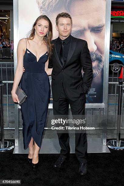 Elsa Cocquerel and Todd Lasance attend the premiere of 'The Water Diviner' at TCL Chinese Theatre on April 16, 2015 in Hollywood, California.