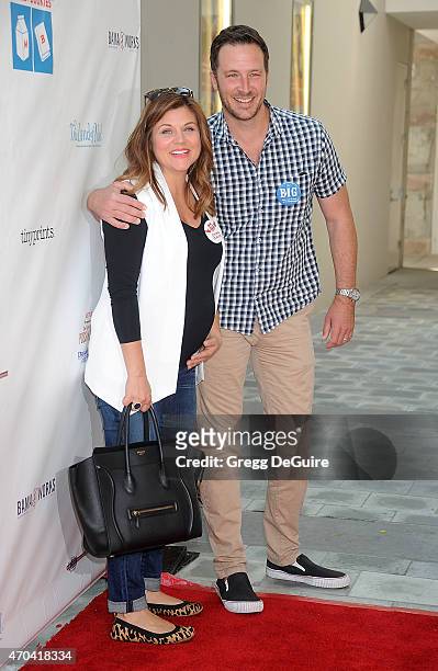 Actress Tiffani Thiessen and husband Brady Smith arrive at the Milk + Bookies 6th Annual Story Time Celebration at Skirball Cultural Center on April...