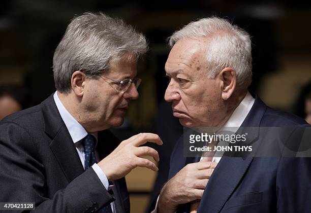 Italian Foreign Affairs minister Paolo Gentiloni talks with Spain's Minister of Foreign Affairs and Cooperation Jose Manuel Garcia Margallo during an...
