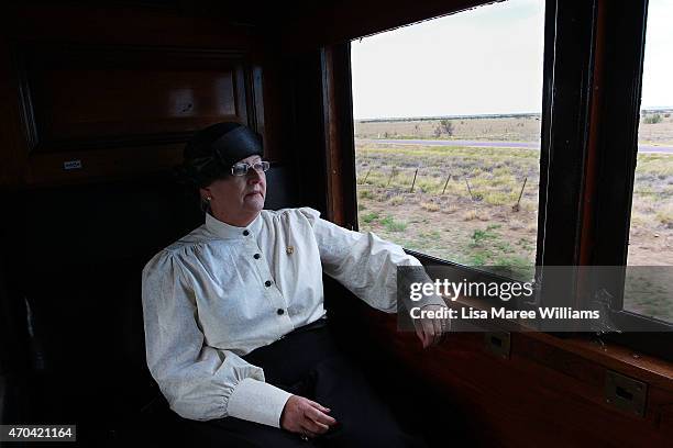 Service woman Lee Forbes sits aboard the ANZAC Troop Train on April 20, 2015 in Winton, Australia. The 2015 ANZAC Troop Train Re-Enactment...