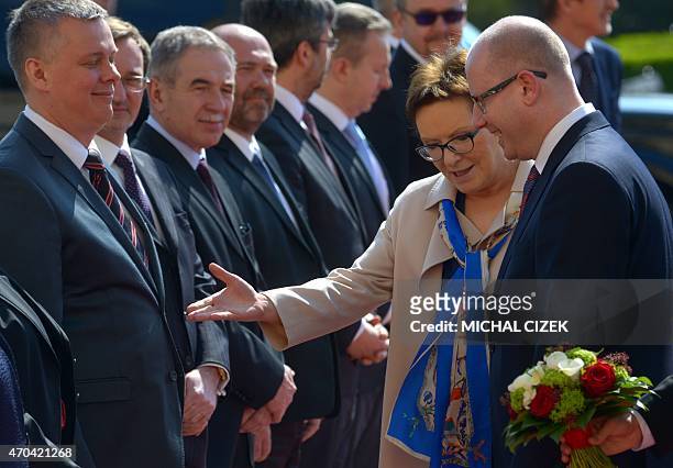 Polish Prime minister Ewa Kopacz talks with Czech Prime Minister Bohuslav Sobotka during a welcoming ceremony on April 20, 2015 in Prague. AFP PHOTO...