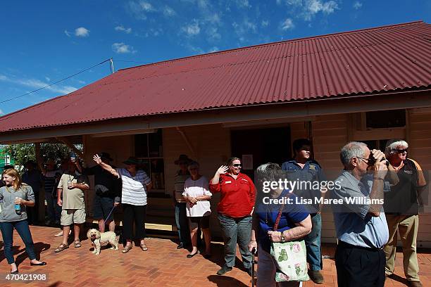 Members of the public welcome the arrival of the ANZAC Troop Train at Longreach station on April 20, 2015 in Longreach, Australia. The 2015 ANZAC...