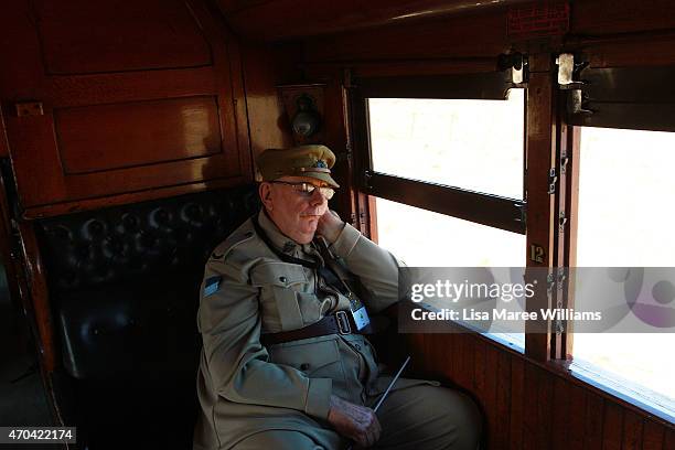 Passenger sleeps on the ANZAC Troop Train as it travels from Winton to Longreach on April 20, 2015 in Winton, Australia. The 2015 ANZAC Troop Train...