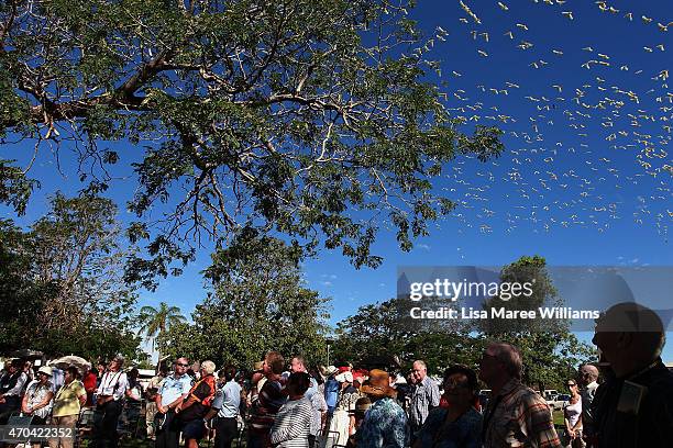 Passengers and members of the public gather for a wreath laying ceremony on April 20, 2015 in Longreach, Australia. The 2015 ANZAC Troop Train...