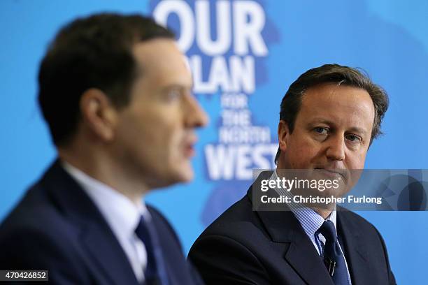 Prime Minister and leader of the Conservative Party, David Cameron and Chancellor George Osborne address guests and supporters during a visit to...