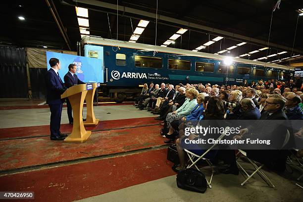 Prime Minister and leader of the Conservative Party, David Cameron and Chancellor George Osborne address guests and supporters during a visit to...