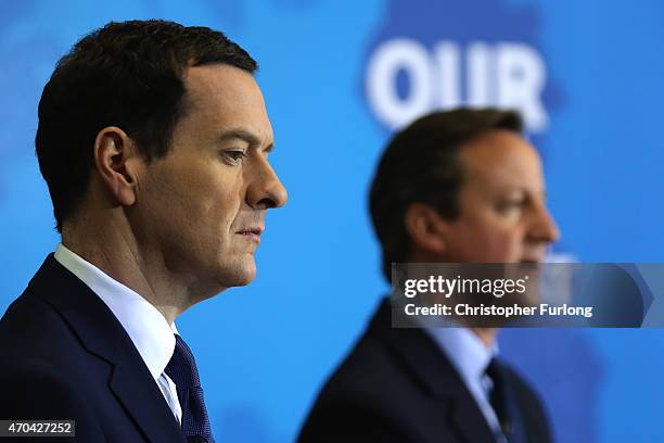 Prime Minister and leader of the Conservative Party, David Cameron and Chancellor George Osborne address guests and supporters during a visit to...