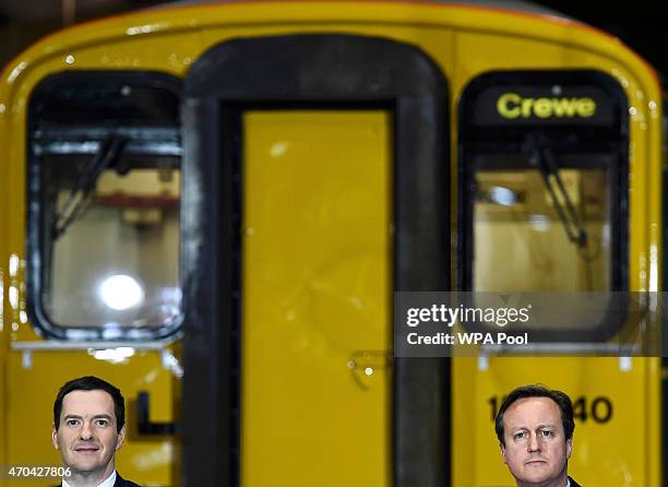 Prime Minister David Cameron and Chancellor of the Exchequer George Osborne address guests during a visit to Arriva TrainCare mantenance plant in...