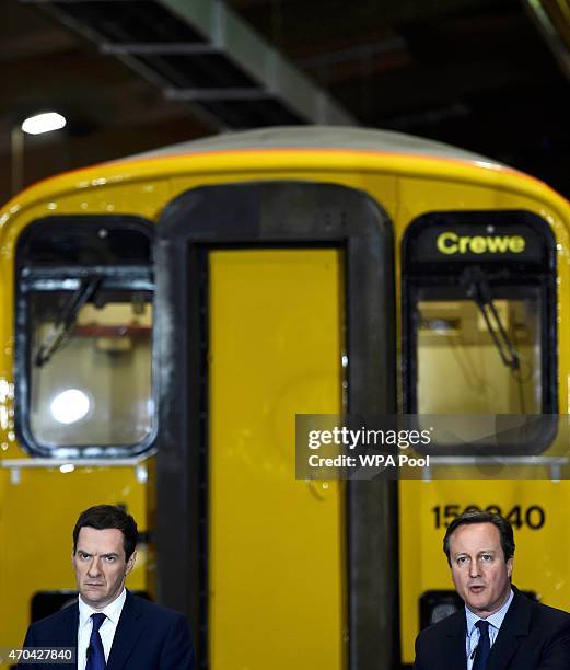 Prime Minister David Cameron and Chancellor of the Exchequer George Osborne address guests during a visit to Arriva TrainCare mantenance plant in...