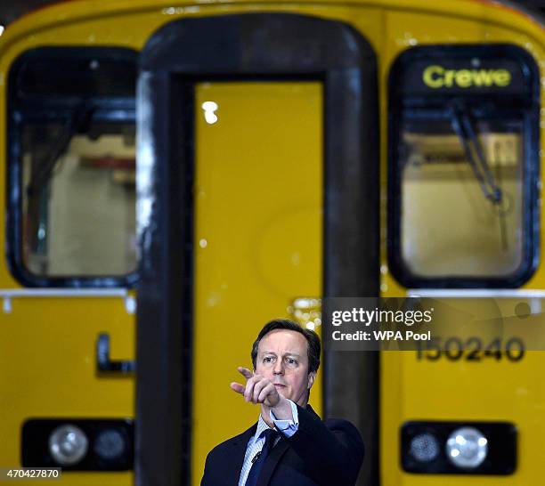 Prime Minister David Cameron addresses guests during a visit to Arriva TrainCare mantenance plant in Crewe during the fourth week of their election...