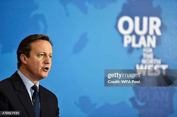 Prime Minister David Cameron addresses guests during a visit to Arriva TrainCare mantenance plant in Crewe during the fourth week of their election...