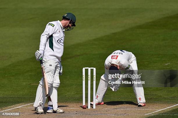 Richard Oliver of Worcestershire looks on and wicketkeeper Ben Brown of Sussex despairs as the ball hits the base of the stumps without dislodging...