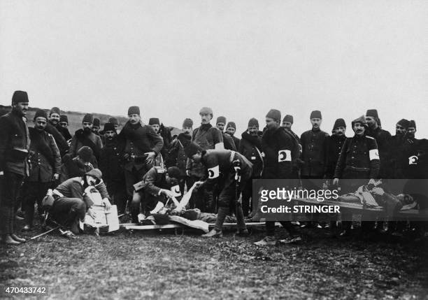 Picture released by the International Contemporary Documentation Library in August 1915 shows members of the Red Crescents evacuating wounded...
