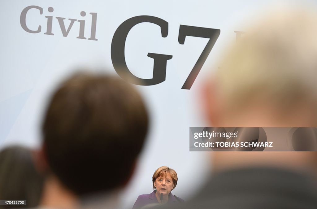 GERMANY-POLITICS-NGO-G7-MERKEL