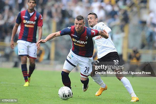 Marcel Buchel of Bologna FC competes the ball with Zoran Kvrzic of AC Spezia during the Serie B match between Bologna FC and AC Spezia at Stadio...