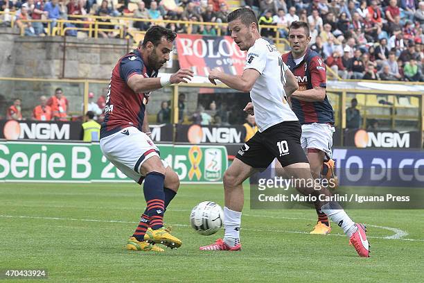 Andrea Catellani of AC Spezia competes the ball with Domenico Maietta of Bologna FC during the Serie B match between Bologna FC and AC Spezia at...