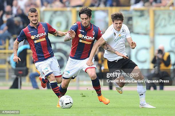 Luca Ceccarelli of Bologna FC competes the ball with Mario Situm of AC Spezia during the Serie B match between Bologna FC and AC Spezia at Stadio...