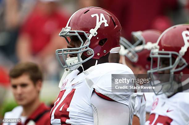 Cam Robinson of the White team watches action prior to the University of Alabama Crimson Tide A-day spring game at Bryant-Denny Stadium on April 18,...