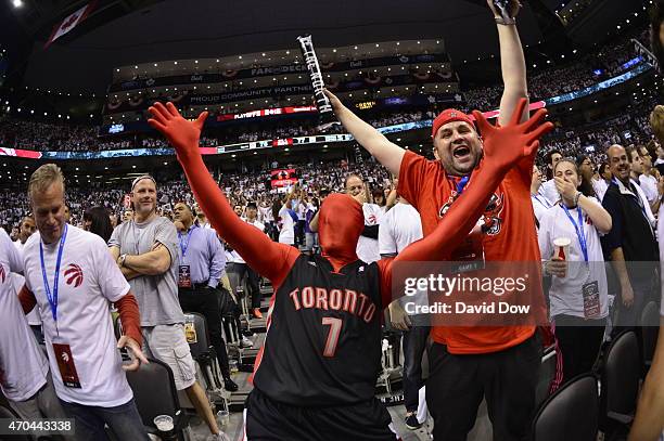 Fans cheer during Game One of the Eastern Conference Playoffs Washington Wizards against the Toronto Raptors at the Air Canada Centre on April 18,...
