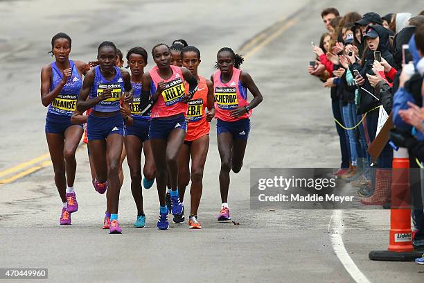 The Elite Women, led by Joyce Chepkirui and Caroline Kilel of Kenya, run during the 119th Boston Marathon on April 20, 2015 in Boston, Massachusetts.