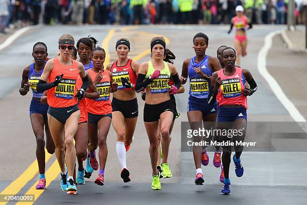 The Elite Women, led by Aleksandra Duliba of Belarus, and Caroline Kilel of Kenya, run during the 119th Boston Marathon on April 20, 2015 in Boston,...