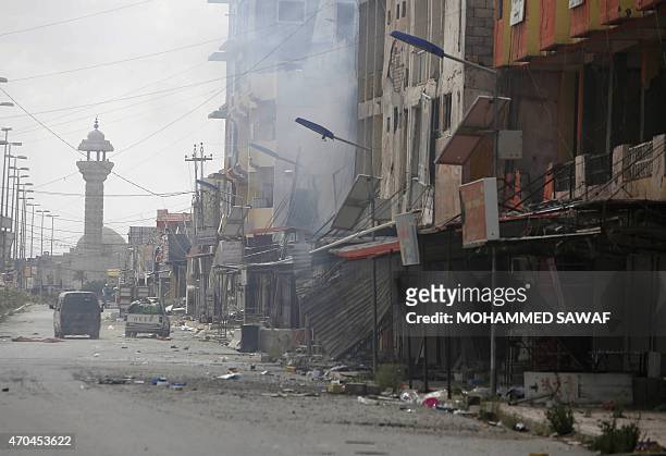 General view taken on April 5, 2015 shows destruction in a street in Tikrit after Iraqi forces retook the nothern city from Islamic State group...
