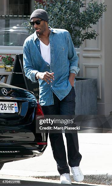 Kobe Bryant, 24 of the 'Los Angeles Lakers' is seen leaving the 'Maison de la Truffe' restaurant on April 20, 2015 in Paris, France.