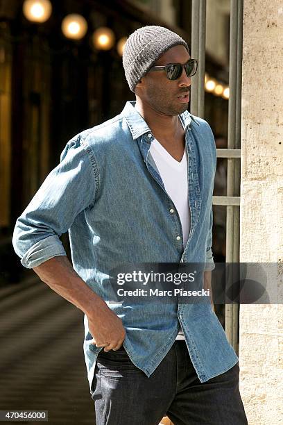 Kobe Bryant, 24 of the 'Los Angeles Lakers' leaves the 'Christian Louboutin' store on April 20, 2015 in Paris, France.