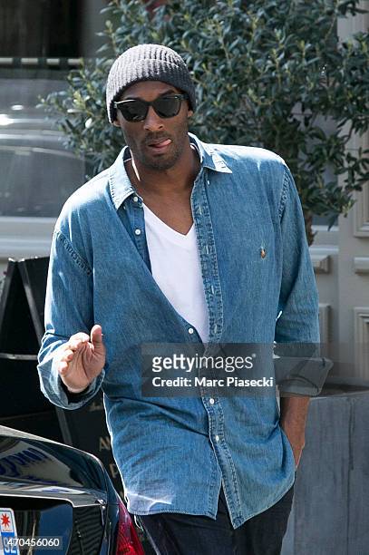 Kobe Bryant, 24 of the 'Los Angeles Lakers' is seen leaving the 'Maison de la Truffe' restaurant on April 20, 2015 in Paris, France.