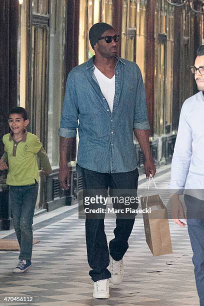 Kobe Bryant, 24 of the 'Los Angeles Lakers' leaves the 'Christian Louboutin' store on April 20, 2015 in Paris, France.