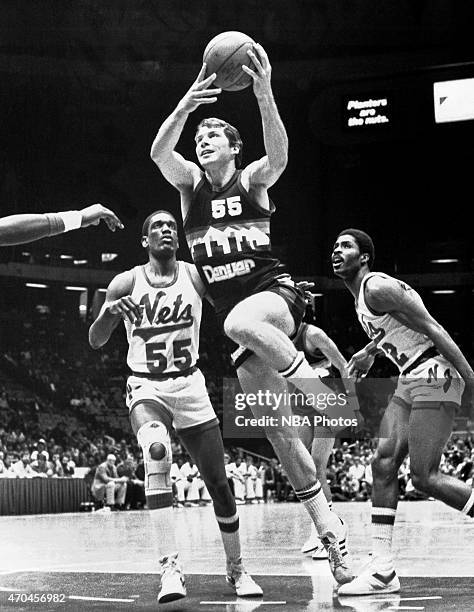 Kiki Vandewghe of the Denver Nuggets shoots against the New Jersey Nets circa 1980 at the McNichols Sports Arena in Denver, CO. NOTE TO USER: User...