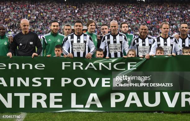 Former Real Madrid players and goodwill ambassadors for the United Nations Development Programme Brazil's Ronaldo and France's Zinedine Zidane pose...