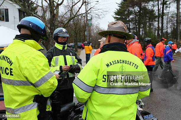 Massachusetts State Police stand near the starting line before the 119th Boston Marathon on April 20, 2015 in Hopkinton, Massachusetts.