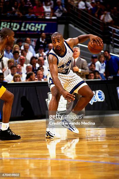 Dennis Scott of the Orlando Magic handles the ball against the Indiana Pacers during game 1 of the Eastern Conference Finals on May 23, 1995 at the...