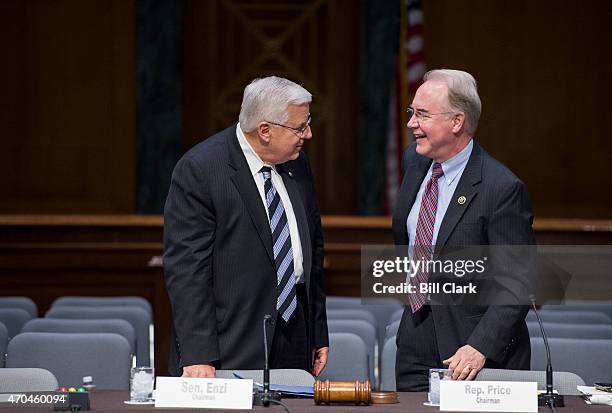 Senate Budget Committee chairman Mike Enzi, R-Wyo., left, speaks with House Budget Committee chairman Tom Price, R-Ga., before the start of the...