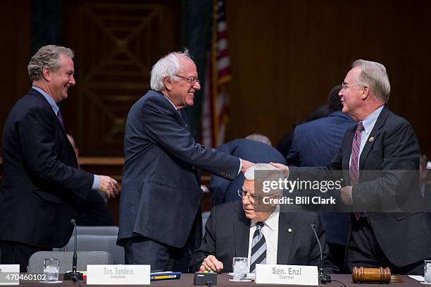 From left, House Budget Committee ranking member Chris Van Hollen, D-Md., Senate Budget Committee ranking member Bernie Sanders, I-Vt., Senate Budget...