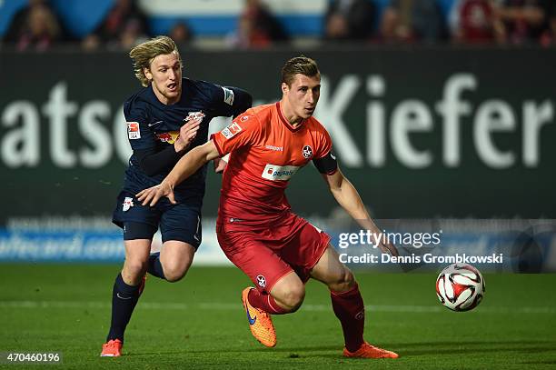 Emil Forsberg of RB Leipzig is blocked from the ball by Willi Orban of 1. FC Kaiserslautern during the Second Bundesliga match between 1. FC...