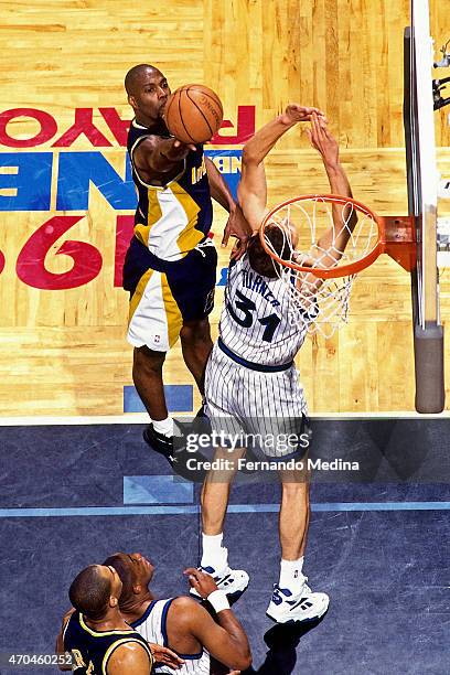 Dale Davis of the Indiana Pacers shoots the ball against the Orlando Magic during game 7 of the Eastern Conference Finals on June 4, 1995 at the...