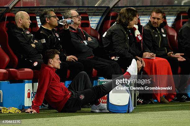 Simon Zoller of 1. FC Kaiserslautern watches the match from bench side after suffering an injury during the Second Bundesliga match between 1. FC...