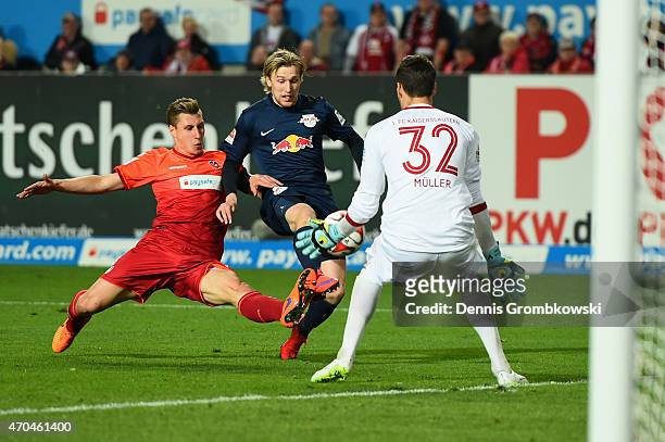 Emil Forsberg of RB Leipzig misses a chance at goal under the pressure of Willi Orban and Marius Mueller of 1. FC Kaiserslautern during the Second...