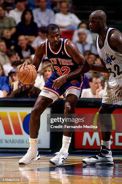 Herb Williams of the New York Knicks handles the ball against the Orlando Magic on October 10, 1995 at the Amway Arena in Orlando, Florida. NOTE TO...