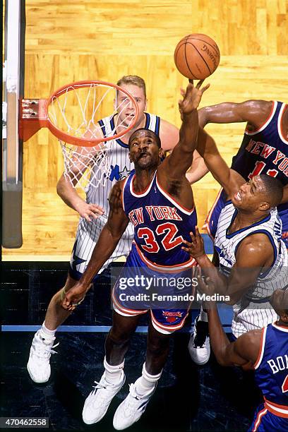 Herb Williams of the New York Knicks shoots against the Orlando Magic on October 10, 1995 at the Amway Arena in Orlando, Florida. NOTE TO USER: User...