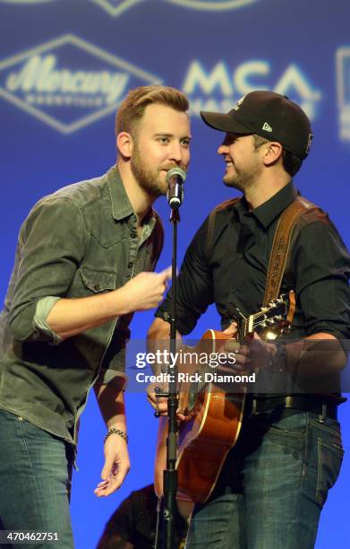Charles Kelley surprises Luke Bryan with a dance off during Luke's performance at Team UMG at The Ryman as part of CRS 2014 on February 19, 2014 at...